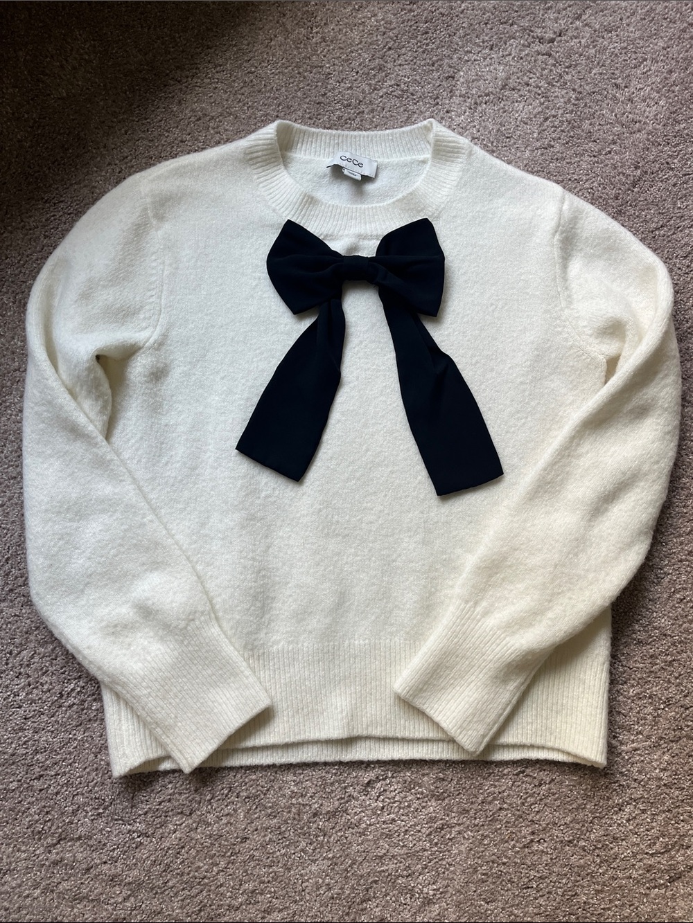 CeCe Cream Knit Crewneck Sweater with Black Bow